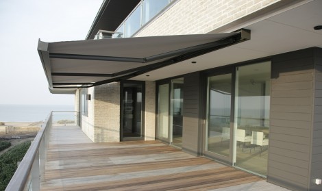 Brustor terrace cover installed over a raised terract