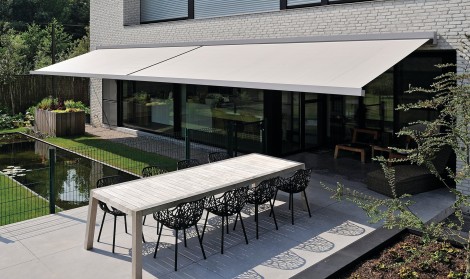 Brustor awning installed over a garden patio