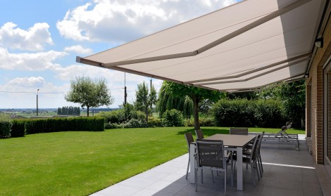 Brustor Garden awning installed over a patio - side view
